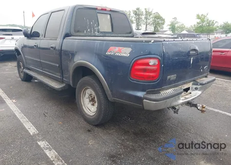 2002 Ford F-150 Lariat/Xlt z USA, uszkodzony, nr VIN 1FTRW08L32KB95040